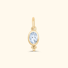Gold plated birthstone hanger met ovale aquamarijn en sierlijk detail – Josephina Jewelry